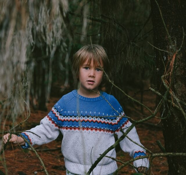 Boy wearing a full sleeve raglan T-shirt in forest by Synerg, leading boys T-shirt manufacturer and children’s T-shirts manufacturers & suppliers in India.