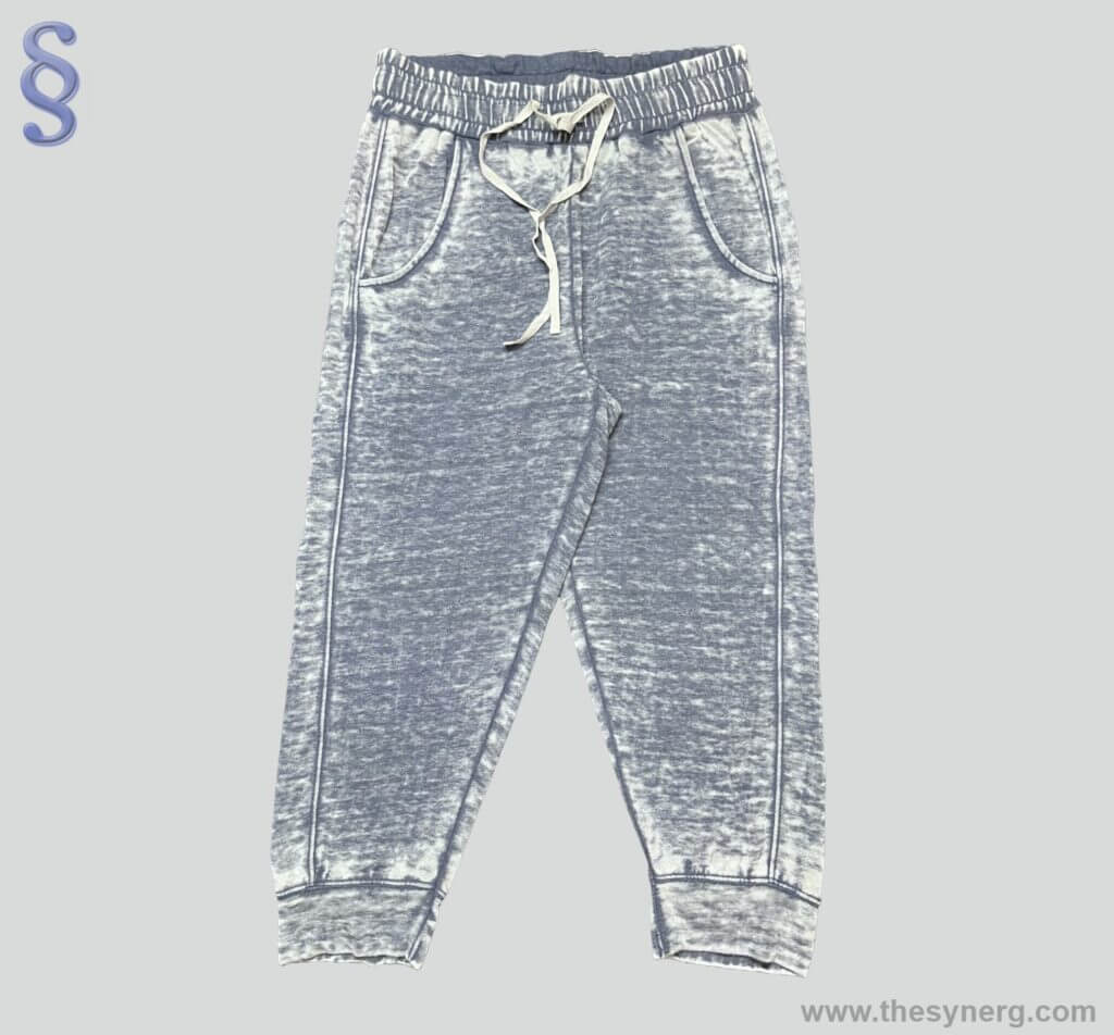 Acid washed sports pant made by Synerg which is a sportswear manufacturer