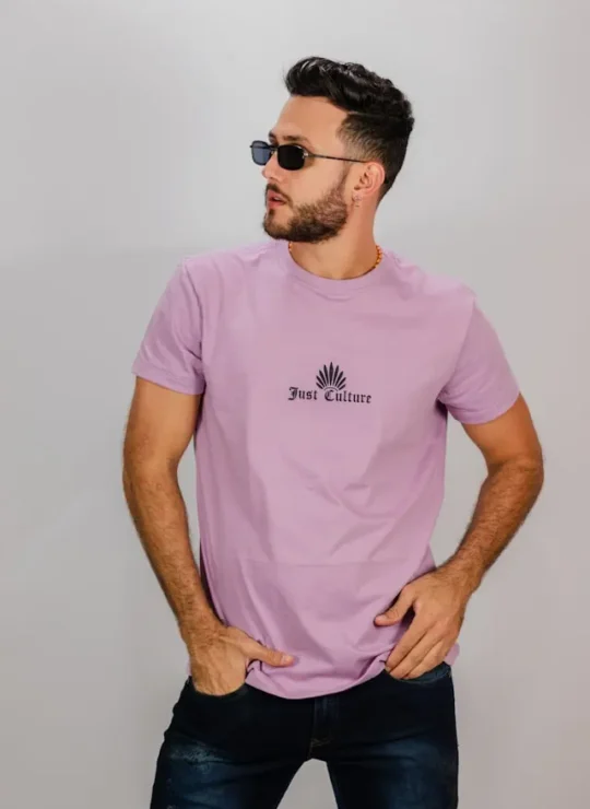 Man wearing a plain round-neck cotton T-shirt by Synerg, high-quality T-shirt manufacturers in India.