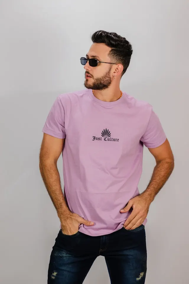Man wearing a plain round-neck cotton T-shirt by Synerg, high-quality T-shirt manufacturers in India.